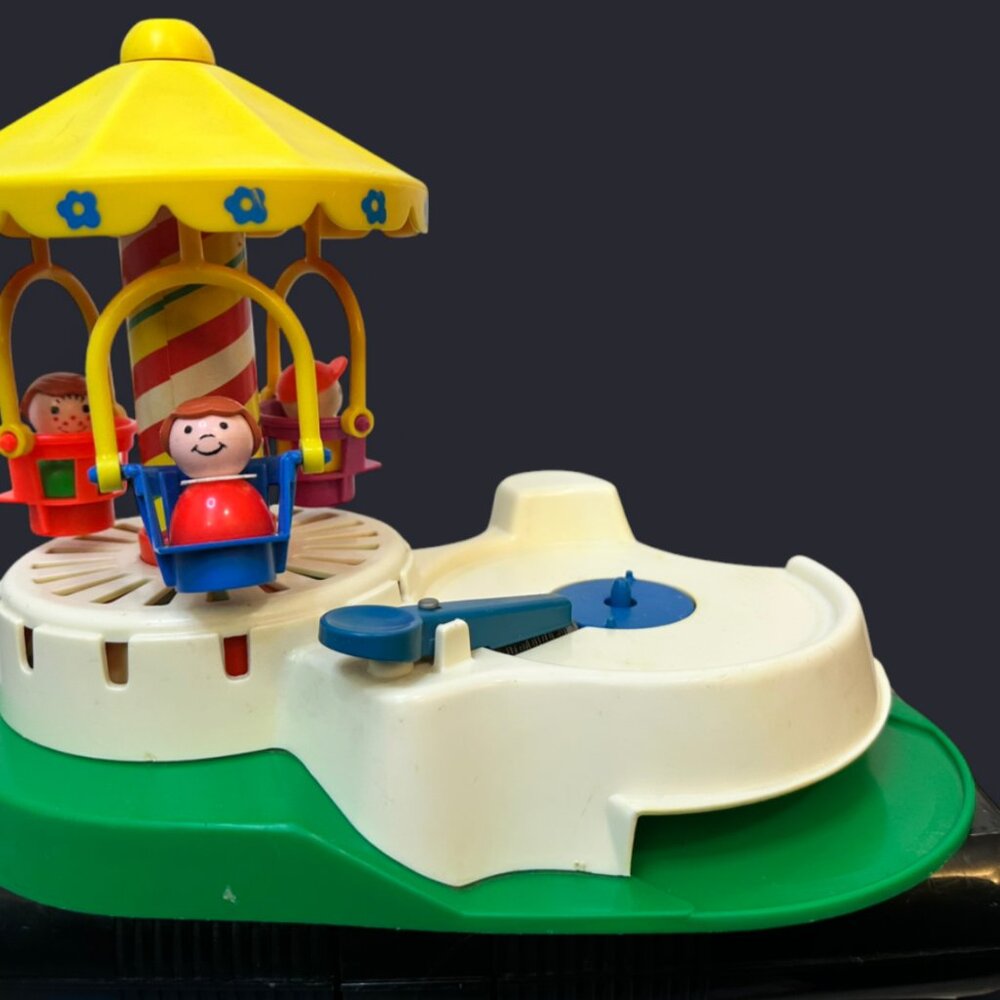 Vintage Fisher Price Change-A-Tune Carousel